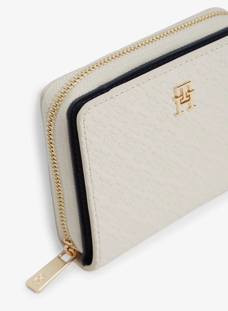 TOMMY HILFIGER  Icon Debossed Zip-Around Flap Wallet for Women | Best Price UAE